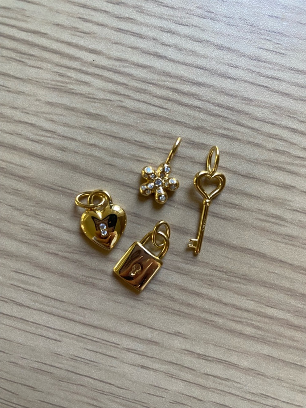Melanie Auld gold plated pendants